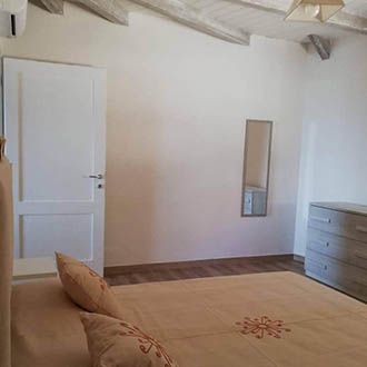 Camera di una capanna dell'agriturismo Dolceluna